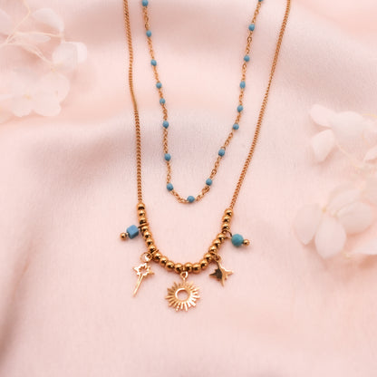 Collier double perles et breloques