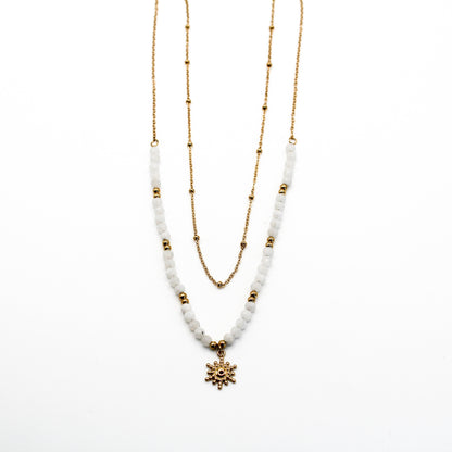 Collier double perles et pendentif soleil